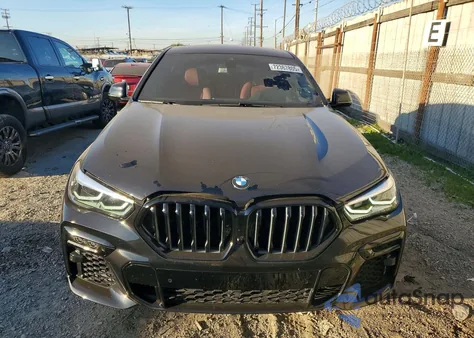 2022 BMW X6 xDrive40I z USA, uszkodzony, nr VIN 5UXCY6C00N9K38873